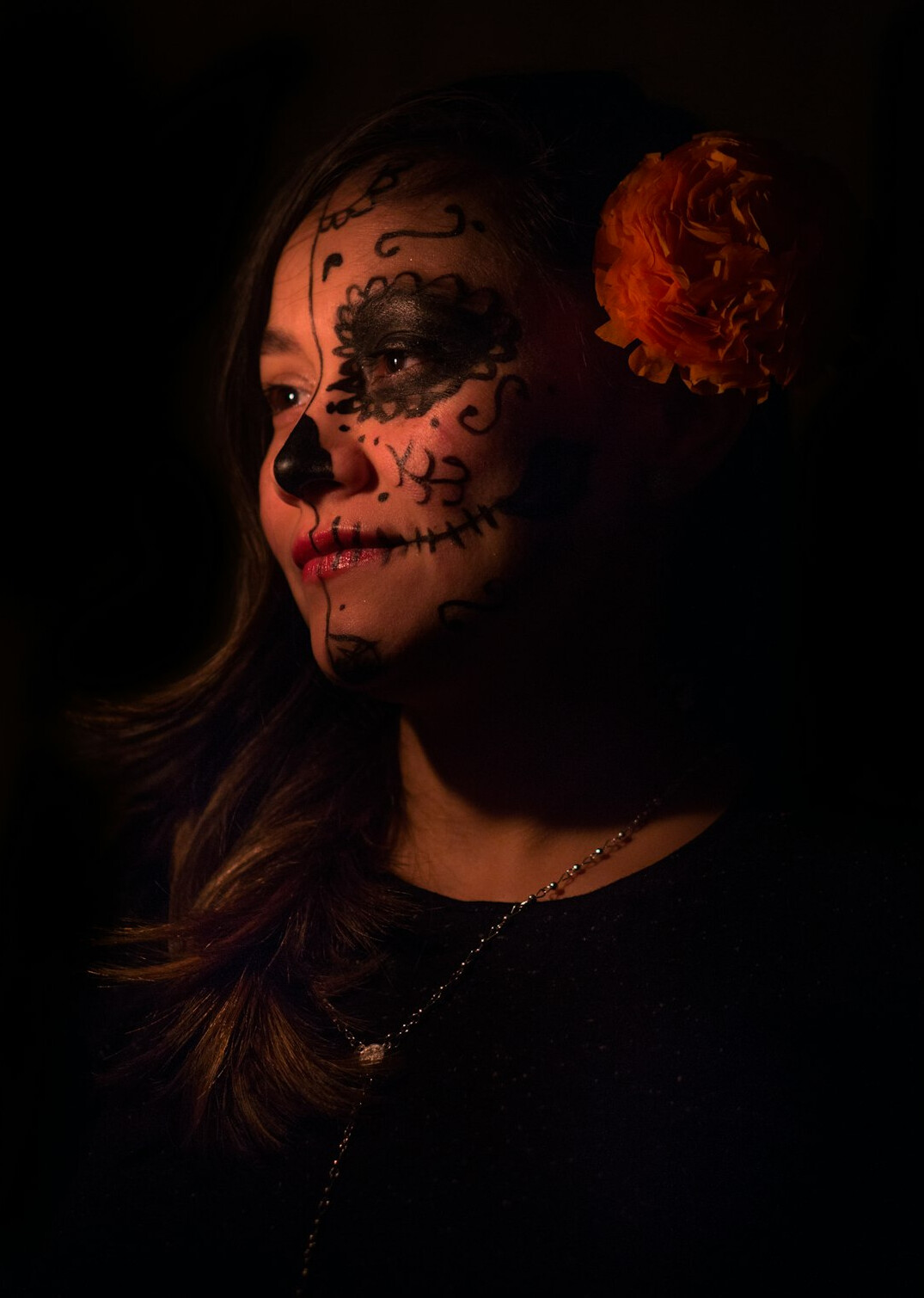 Studio portrait of a Mexican woman with a warm smile