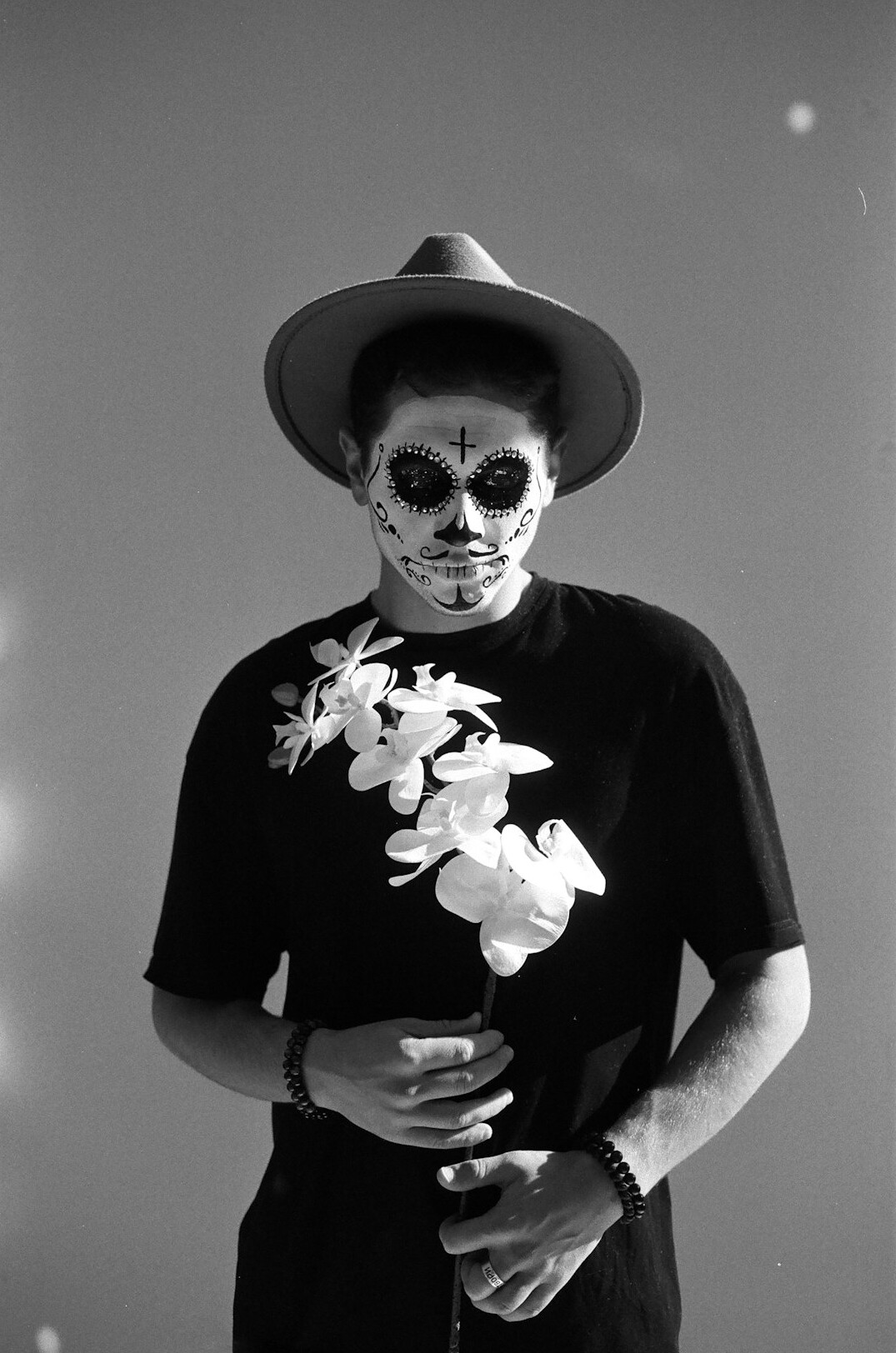 Studio portrait of a Mexican man with glasses