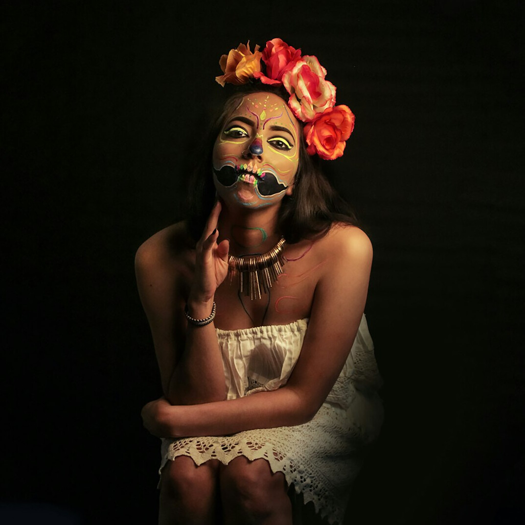 Studio portrait of a young Mexican woman