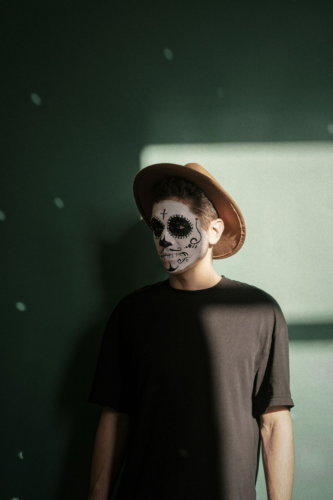 Studio portrait of a Mexican man with a friendly expression