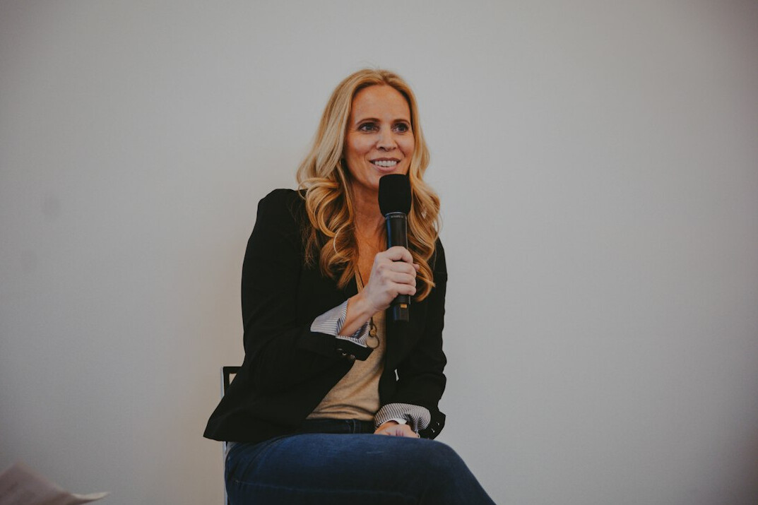 confident speaker on stage