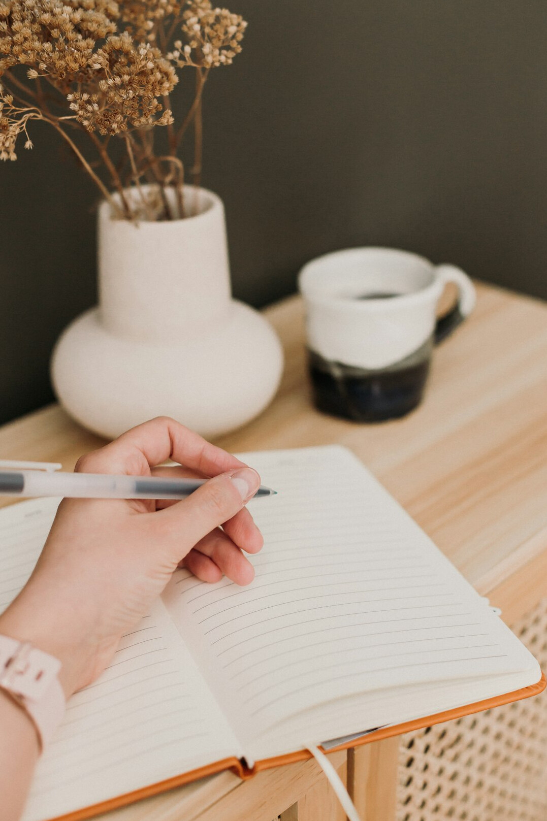 person writing notes